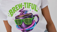 Load and play video in Gallery viewer, Brew-tiful Coffee Tee — Retro Neon Coffee Cup Graphic T-Shirt